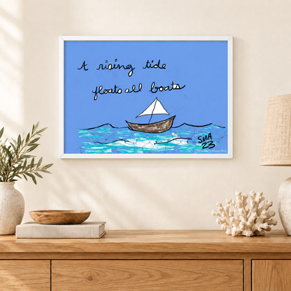 A Rising Tide by Stephanie Anderson, white-framed artwork in a coastal room, with Strawberry Moon Arts watermark.